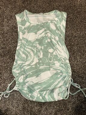 White and green swirl tank